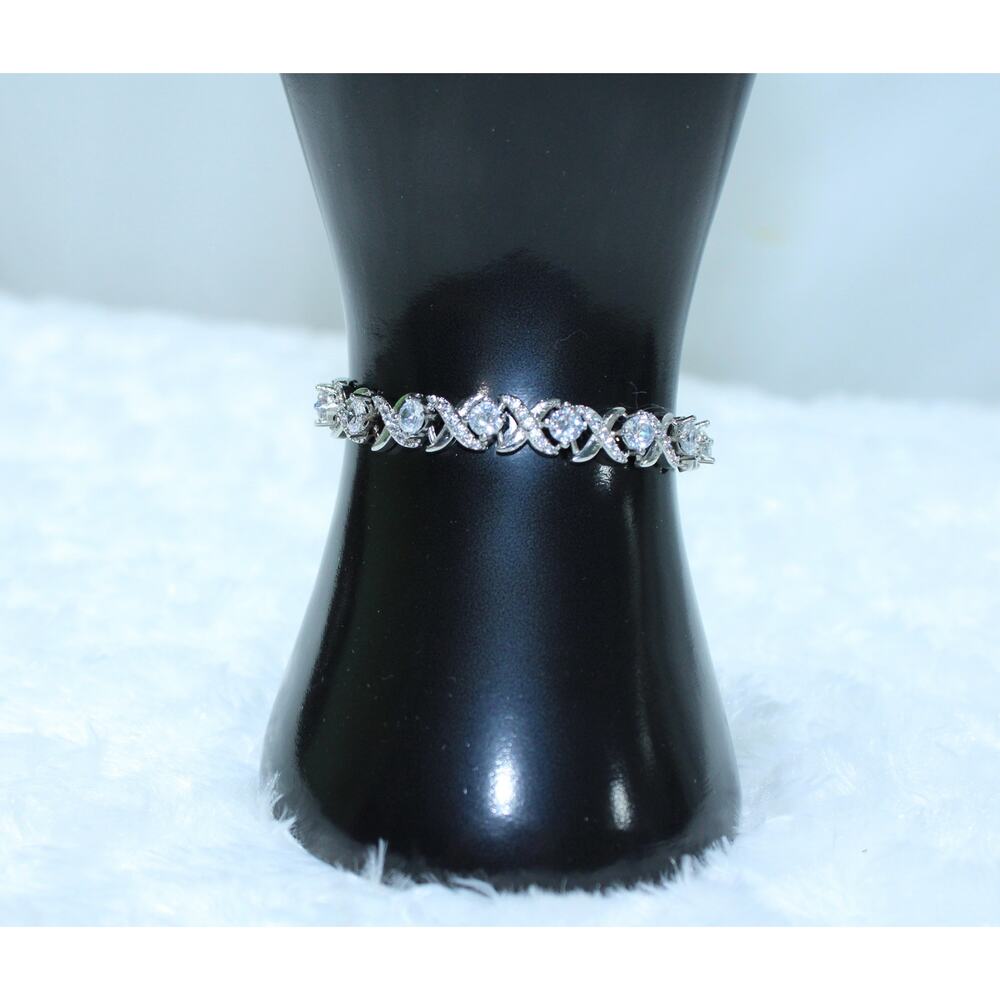 Women’s SILVER  " X " Adjustable Bracelet